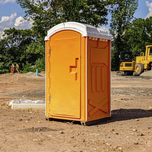 how often are the portable restrooms cleaned and serviced during a rental period in Chamita New Mexico